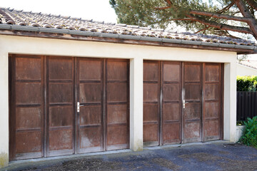 Fototapeta na wymiar double old wooden door garage 