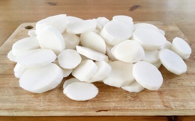 Sliced white radish on butcher