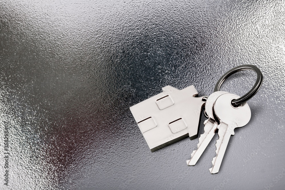 Canvas Prints House shaped keychain and keys on desk