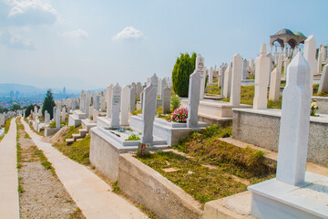 Martyrs’ Cemetery Kovaci:
White graves of the muslim graveyard on the hill above the city. Total...
