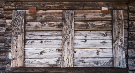 Old wooden window of rural house.