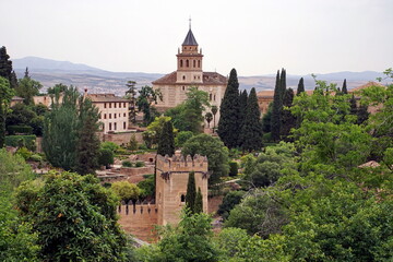 Fototapeta na wymiar Alhambra or Red Castle in Granada spanish city, located on top of hill al-Sabika. Moorish palace fortress complex in Andalusia, Spain