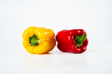 Two of Bell pepper red and yellow isolated on white background