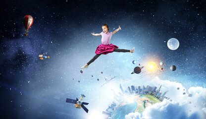 Obraz na płótnie Canvas Kids jumping in the sky