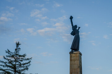Fototapeta na wymiar Novi Sad, Serbia - May 31. 2020: Monument in front of the Serbian Orthodox Church in Srbobran 