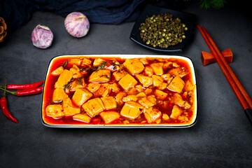 Bean-curd soup seasoned with red pepper
