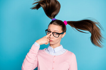 Close-up portrait of her she nice attractive pretty girlish intelligent funky college girl touching specs study learn academic knowledge isolated over bright vivid shine vibrant blue color background