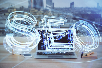 Multi exposure of table with computer and seo drawing hologram. Search optimization concept.