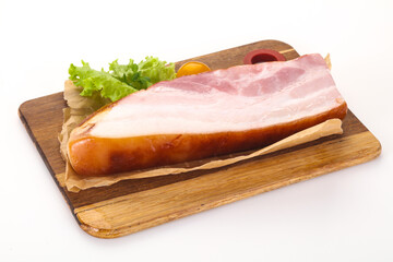 Smoked pork breast with salad leaves