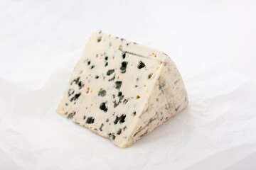 cheese containing veins of blue mold, such as Gorgonzola and Danish Blue.