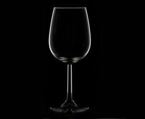 wine glass isolated on a black background.