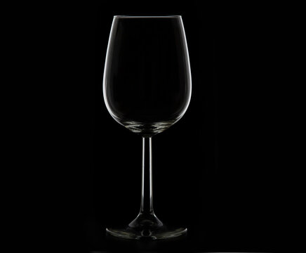 wine glass isolated on a black background.