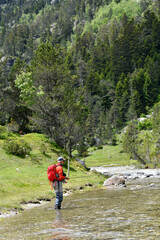 Obraz premium fly fisherman in the high mountains