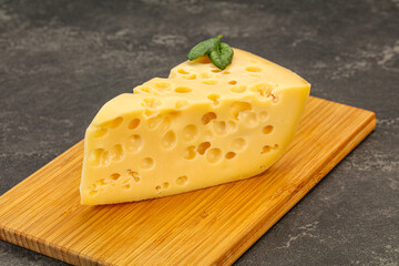 Maasdam cheese - yellow triangle with holes