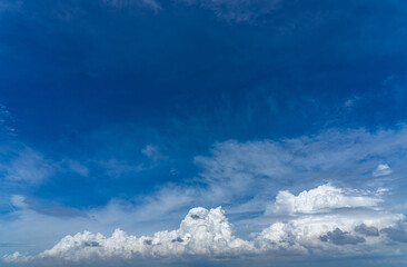 Fototapeta premium Vast white cumulus clouds with blue sky background