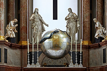 silver statue church globe art