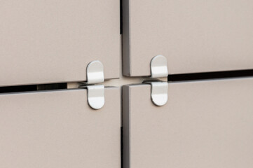 close up of the wall of a modern building with a ventilated facade. Composite facade panels.