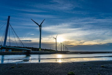 Gaomei Wetlands Area wind turbines in sunset time, a flat land which spans over 300 hectares, also a popular scenic spots in Qingshui District, Taichung City, Taiwan