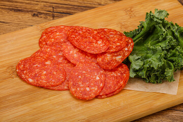 Italian spycy pepperoni sausage slices