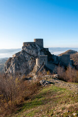 Fototapeta na wymiar Medieval fortress located in Srebrenik, Bosnia and Herzegovina. The fortress was strategically placed on a top of a steep rock, and it was used to defend a large area of land in middle ages.