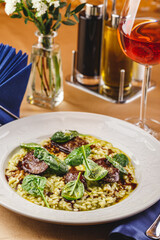Risotto with spinach and chicken liver