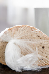 Close up of bread wrapped in a plastic bag