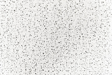 Raindrops on the window covered by the blind created shadows