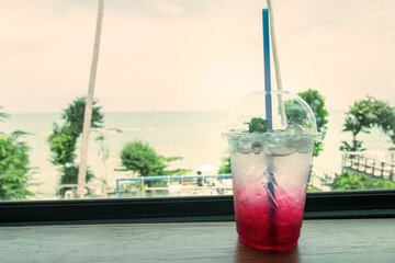 Soft drink mixed with lime and soda Resting on a table overlooking the sea