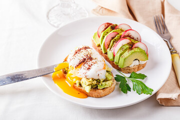 Toast with poached egg and avocado