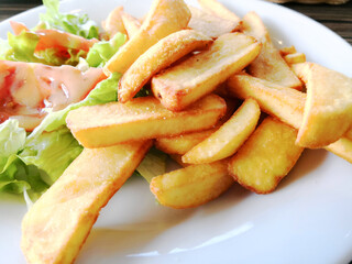 Golden French fries potatoes ready to be eaten