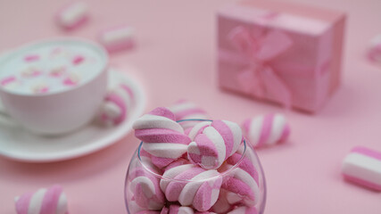 Obraz na płótnie Canvas Pink marshmallows with a delicious hot drink. Little girl's Breakfast. High quality photo.