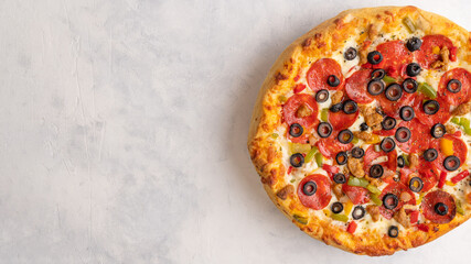 Hot true PEPPERONI ITALIAN PIZZA with salami and cheese. TOP VIEW Delicious traditional pepperoni...