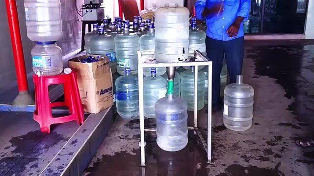 Ideas unlimited.Water replaces  from can to can in India Pondicherry.