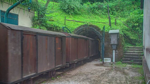 Train entering the Glancnik tunnel and taking tourists for the mine tour in the Moring district, Crna na koroskem, Slovenia.