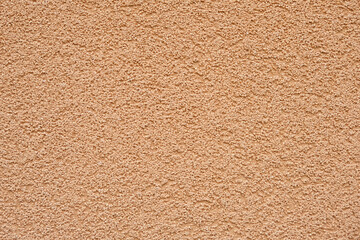 Orange concrete wall texture background, plaster texture