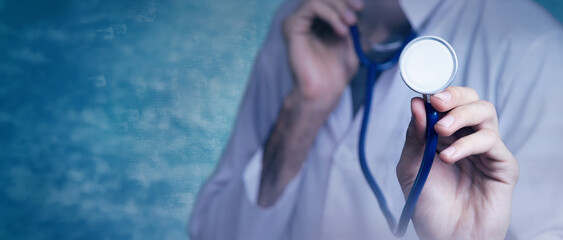 Doctor with stethoscope in a hand medical concept