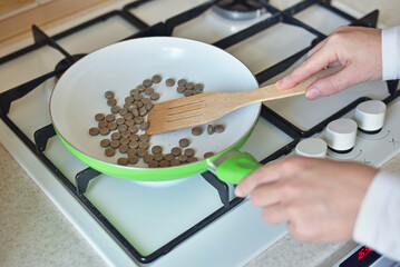 pharmaceutical medicine pills in frying pan