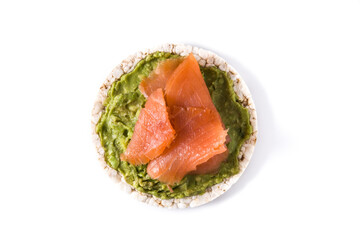 Puffed rice cake with guacamole and salmon isolated on white background. Top view