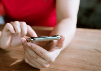 young woman texting on mobile