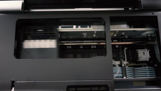 mechanisms work inside the black printer