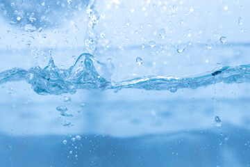 Water droplets moving in waves