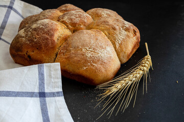 Homemade flower bread and wheat ears