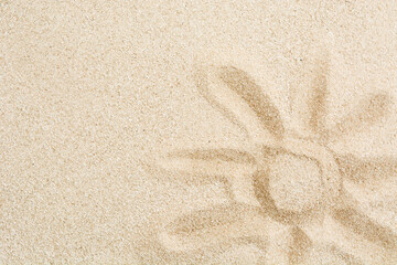 Picture of sun with hand on sand. Summer holiday texture design background. Copy space