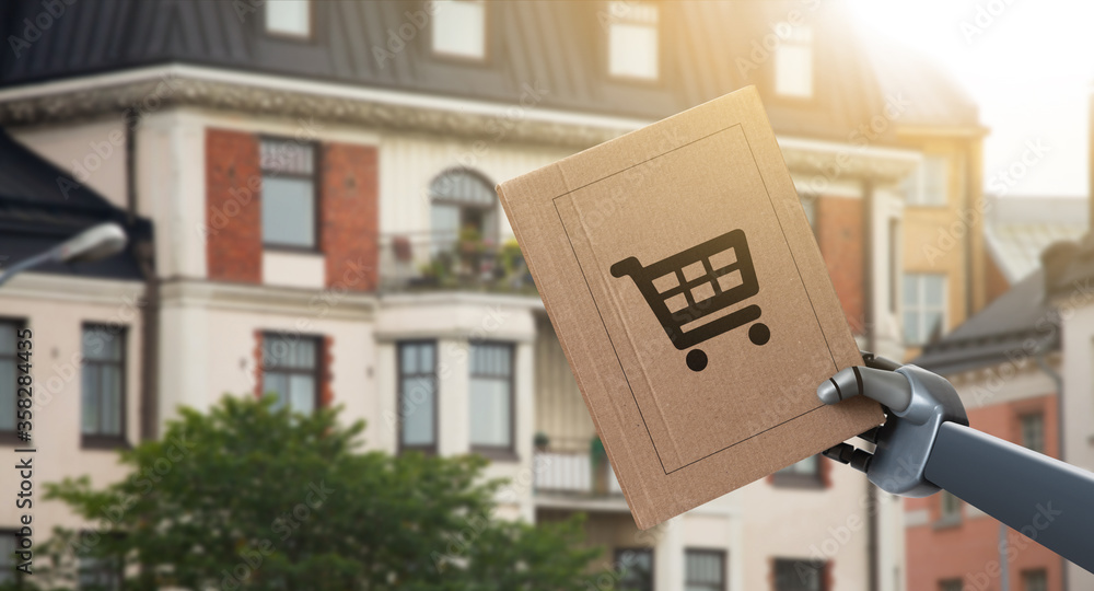 Poster Robot holds a box with a purchase from an online store. Automatic unmanned delivery