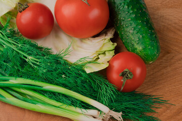Vitamins, elements for salad, tomato, onion, cucumber, dill