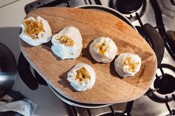 Dumplings with vegetable stuffing and soy sauce with garlic