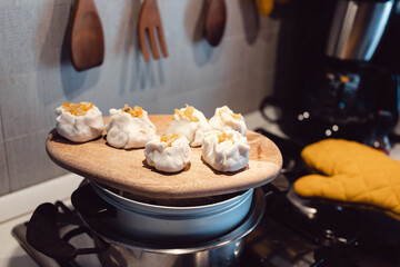 Dumplings with vegetable stuffing and soy sauce with garlic