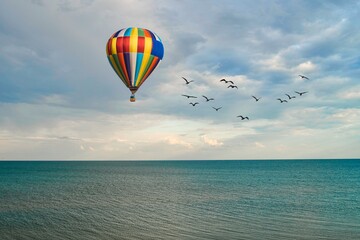 Balloon soars against the blue sky