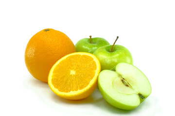 Fresh fruit. Oranges & green apples on the white background.