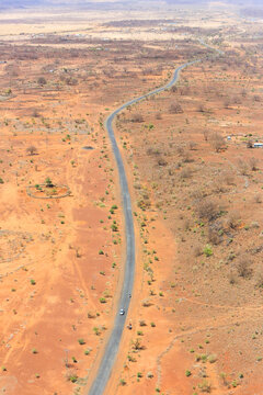 Aerial view of the road to Lake Magadi. The Great Rift Valley is part of an intra-continental ridge system that runs through Kenya from north to south. 